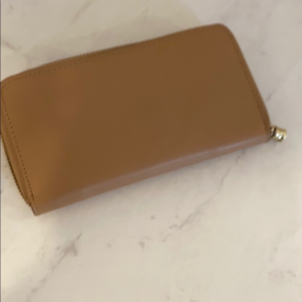 Tan nude 100% leather wallet from Saks